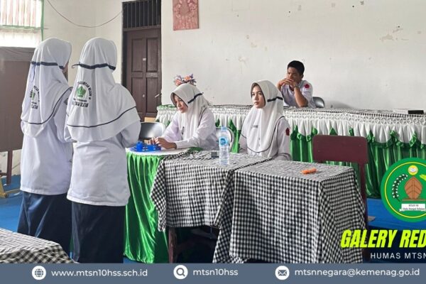 Kepala MTsN 10 HSS Hadiri Pembukaan Olimpiade Ma